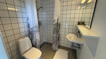 Dutxa, tovalloles, sabó i xampú