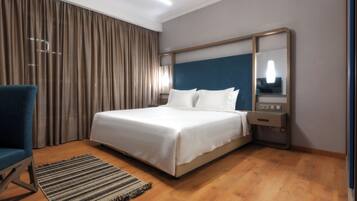 In-room safe, desk, blackout curtains, iron/ironing board