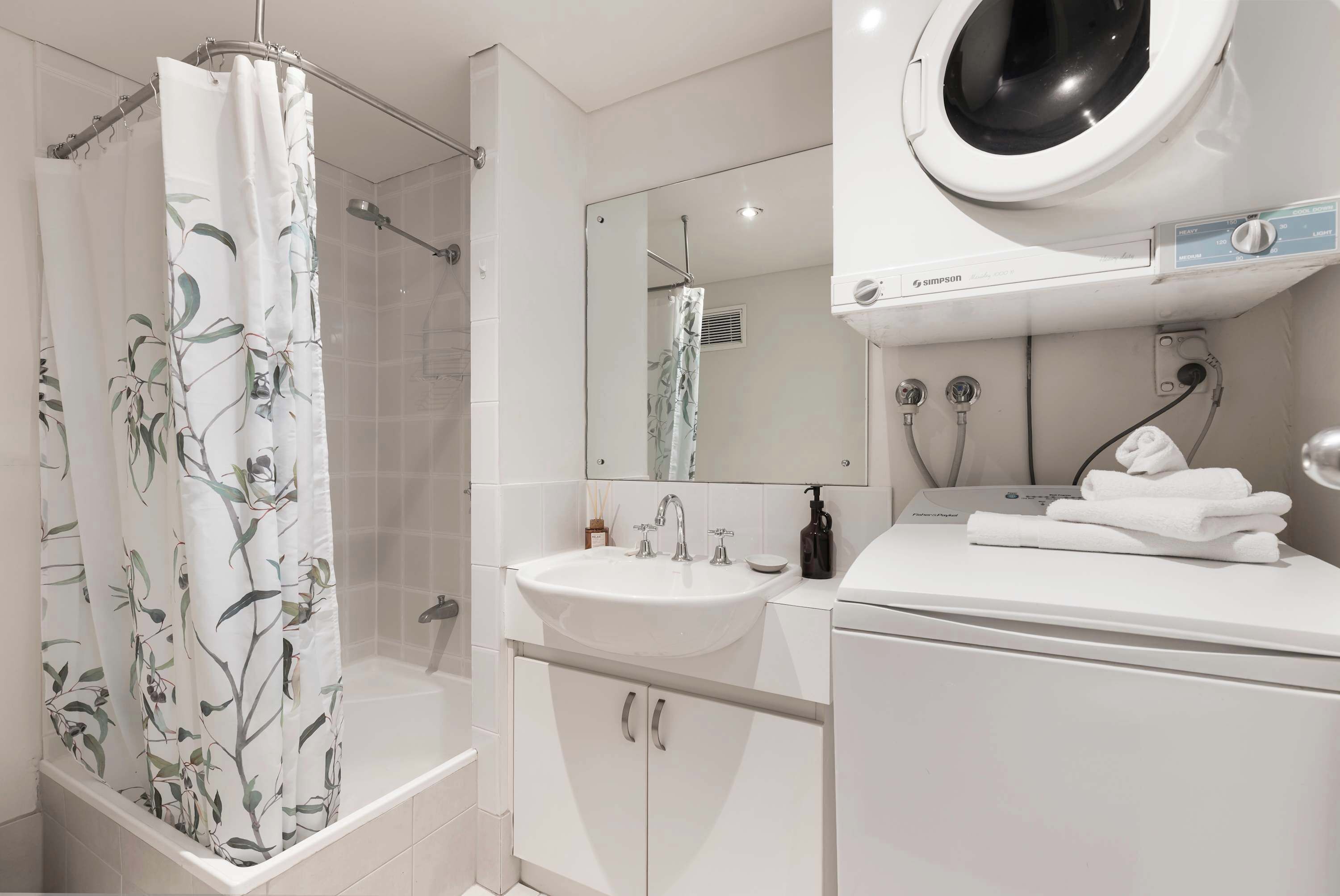 Shower, hair dryer, towels, shampoo