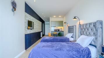 Family Studio Suite, Sea View | Desk, laptop workspace, soundproofing, iron/ironing board