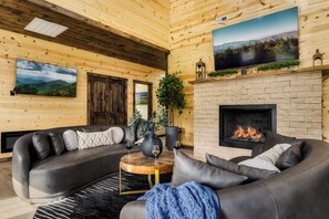 Smart TV, fireplace, table football, books