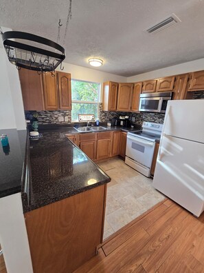 Fridge, microwave, oven, stovetop - Spacious 5-bedroom beautiful water view home with private boat dock! (Homosassa)