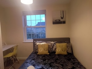 Departamento | 2 habitaciones, tabla de planchar con plancha y wifi gratis 
