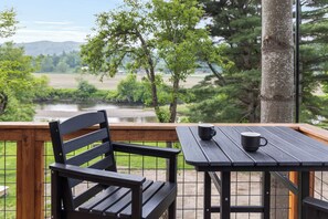 Outdoor dining - Designer A-Frame Treehouse near Stowe w/ Hot Tub, Sauna, Projector & Views (Johnson)