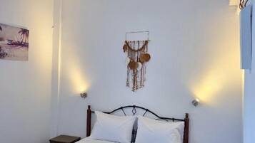 1 habitación, tabla de planchar con plancha, wifi y ropa de cama