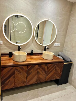 Shower, towels, soap, toilet paper