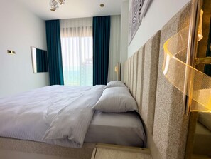 1 chambre, fer et planche à repasser, accès au Wi-Fi (inclus)