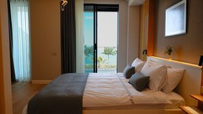 Deluxe Double Room, Balcony, Sea View | Premium bedding, minibar, in-room safe, individually decorated - RUKA Hotel (Izmir)