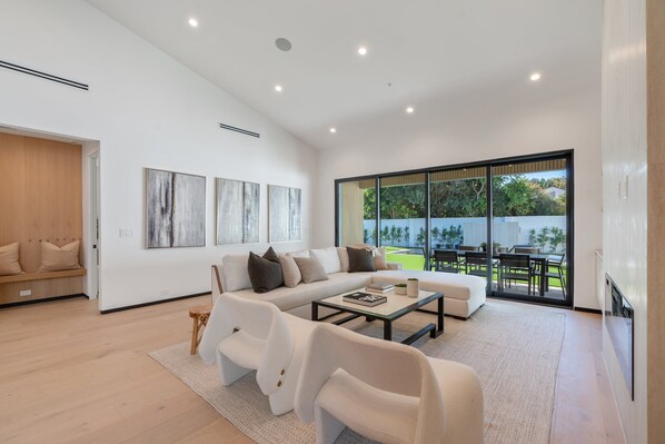 Luxury House, Multiple Beds, Pool Access, Pool View (Noble Modern) | Living area | 42-inch flat-screen TV with digital channels, fireplace - Noble Modern - Urban Sanctuary in Sherman Oaks With Poolside and Patio (Van Nuys)