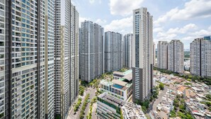 A high-rise residential building complex with multiple apartment buildings, a central open plaza, and surrounding greenery. - PD Pristine Apartment Landmark Plus (Ho Chi Minh City)