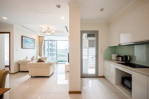 Apartment, 2 Bedrooms | Private kitchen | Fridge, microwave, rice cooker, cookware/dishes/utensils - PD Pristine Apartment Landmark Plus (Ho Chi Minh City)