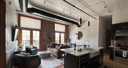 Experience downtown Sheridan in this modern, loft-style 3-bedroom condo, blending historic charm with contemporary design. Perfect for families or groups, it comfortably fits up to 9 guests. Enjoy easy walking access throughout historic downtown.
