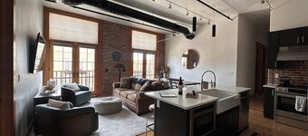 Experience downtown Sheridan in this modern, loft-style 3-bedroom condo, blending historic charm with contemporary design. Perfect for families or groups, it comfortably fits up to 9 guests. Enjoy easy walking access throughout historic downtown.