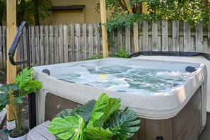 Outdoor spa tub - Stylish 4BR Getaway w/ Hot Tub & Grill! (Omaha)
