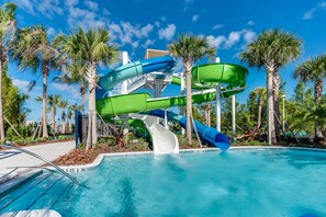 A water park with multiple slides and a pool. - 2210 Lelani Circle (Davenport)