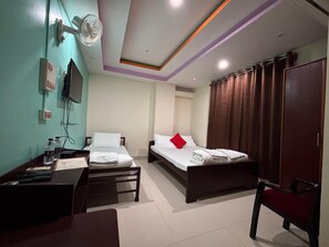 Triple Room | In-room safe, free WiFi, bed sheets - Hotel Famy Palace (Udalguri)