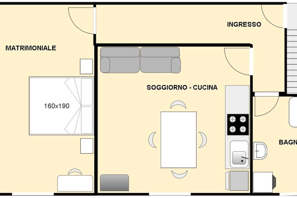 Distribución de una habitación de hotel con sala de estar, cocina, baño y dormitorio independiente.