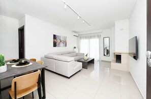 Appartement Deluxe, balcon | Coin séjour