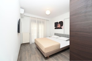 Apartemen Deluks | Ruang kerja ramah laptop, setrika/meja setrika, dan Wi-Fi gratis