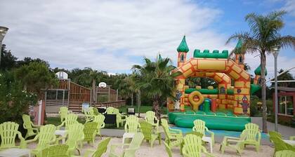 Comfortable mobile home camping with swimming pool and mini farm