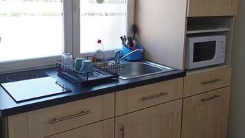 Microondas, placa de cocina