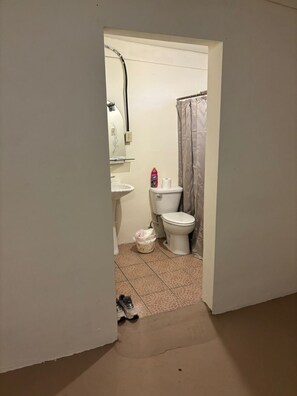 Shower, towels, soap, toilet paper