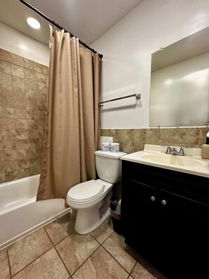 Shower, eco-friendly toiletries, hair dryer, towels