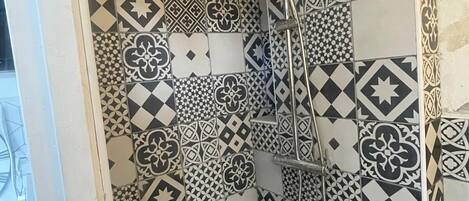 Shower, towels, toilet paper