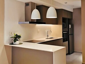 Family Apartment, 2 Bedrooms, Balcony | Private kitchen | Full-size fridge, microwave, oven, stovetop - ABIBA Apart-Hotel & SPA (Asunción)