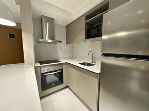 Standard Apartment, 1 Bedroom | Private kitchen | Full-size fridge, microwave, oven, stovetop - ABIBA Apart-Hotel & SPA (Asunción)