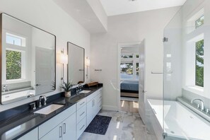 Shower, hair dryer, towels, shampoo