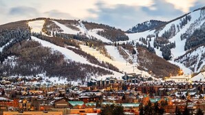 A snow-covered mountain town with ski slopes, buildings, and a ski lift. - Beautiful 1 Bdrm • Historical • Downtown (Salt Lake City)