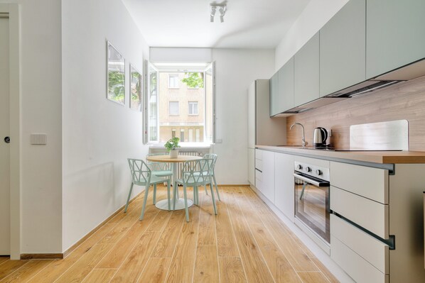 Departamento Confort, vista a la ciudad | Cocina privada