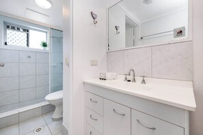 Shower, hair dryer, shampoo