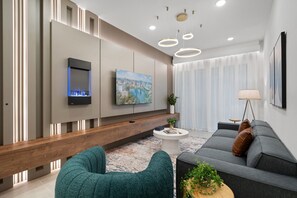 Smart TV, lareira, videogames, pebolim