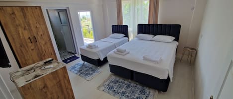 Luxe beddengoed, Select Comfort-bedden, een bureau, beddengoed