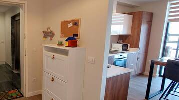 Appartement | Privékeuken | Een kinderstoel