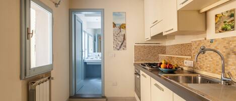 Apartment | Private kitchen | Fridge, oven, stovetop, dishwasher