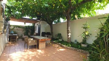 Familie appartement, 3 slaapkamers, uitzicht op tuin | Terras