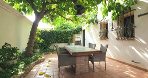 Family Apartment, 3 Bedrooms, Garden View | Terrace/patio