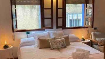 3 slaapkamers, een strijkplank/strijkijzer, beddengoed