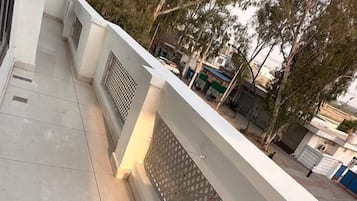 Quarto casal luxo, vista para a cidade | Sacada