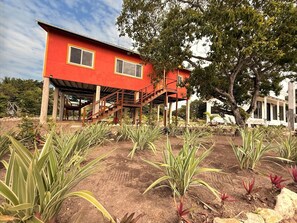 Exterior - Carib House: New 3-bedroom retreat steps from the beach! (Placencia)