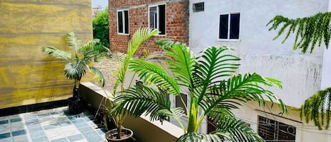 Deluxe Room, City View | Balcony