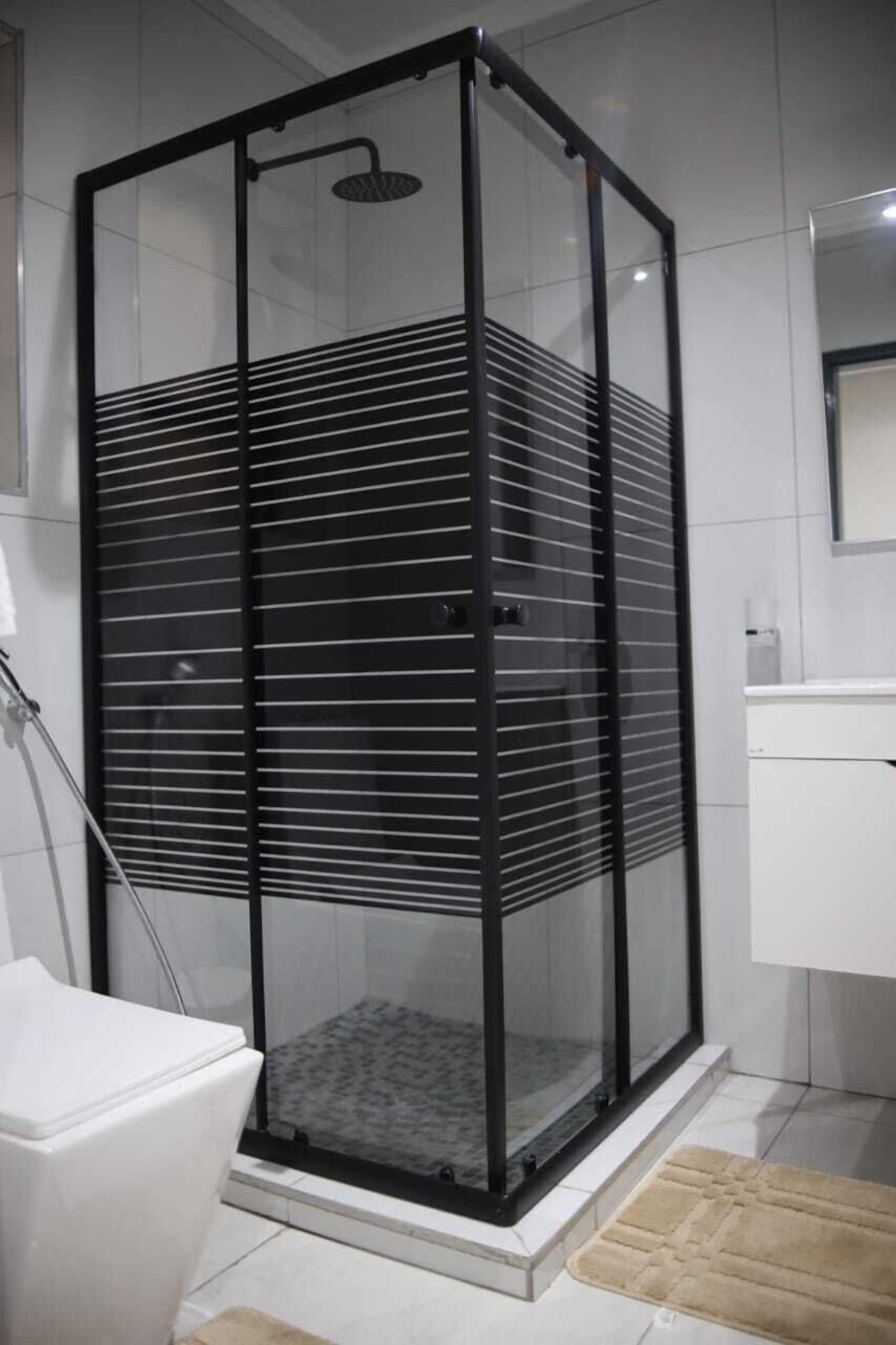 Family Room, City View | Bathroom | Shower, free toiletries, bathrobes, slippers