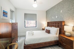 1 bedroom, desk, iron/ironing board, bed sheets