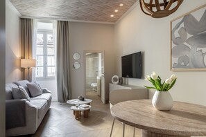 Departamento Premier | 1 habitación, tabla de planchar con plancha, wifi gratis y ropa de cama 