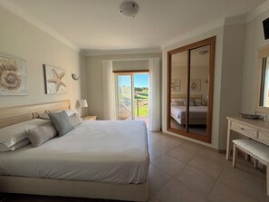 3 quartos, cofres nos quartos, ferros/tábuas de passar roupa