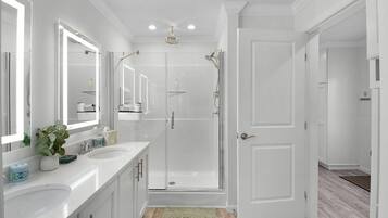 Shower, hair dryer, towels, soap