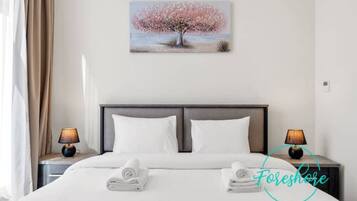 4 slaapkamers, een strijkplank/strijkijzer, wifi